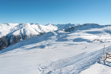 Obraz premium Stunning view of the peaks of Livigno on Carosello 3000 in Livigno, Italy