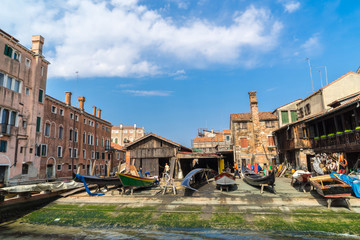 shipyard building and repairing gondolas in venice © Kittichet