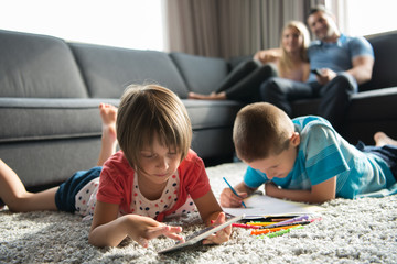 young couple spending time with kids