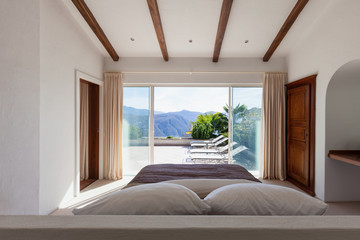 Elegant bedroom with bath tube