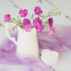 Jug of carnations