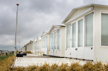 Mobile Homes on a Beach in the Netherlands and Cloudy Sky