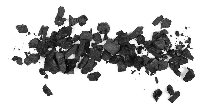 pile black coal isolated on white background, top view
