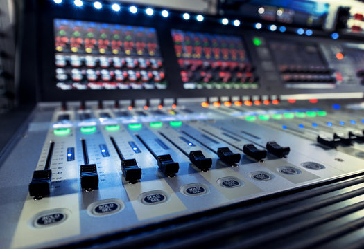 control panel of the sound engineer with the mixers on the television studio