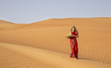 Fototapeta na wymiar Woman in a red sari