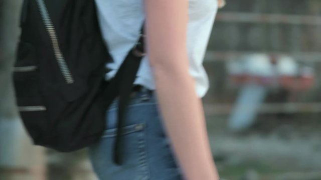 Beautiful woman roller-blading on the seashore 4k