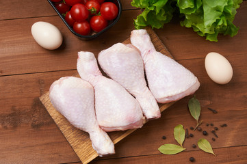 Chicken shin on the wooden table