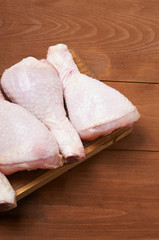 Chicken shin on the wooden table
