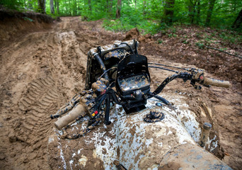 Quad bike on impenetrable road © maxoidos