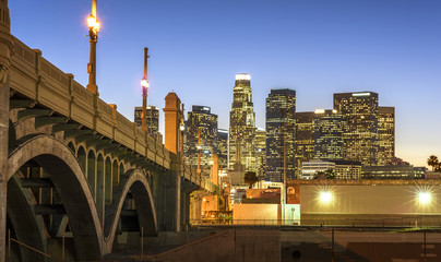 Skyscrapers in downtown Los Angeles California at night. View from under the bridge