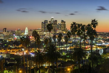 Fotobehang Downtown Cityscape Los Angeles bij zonsondergang © chones