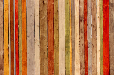 Wooden wall. Multicolored wooden wall. Colored wooden backgrounds textures. Closeup shot of wooden panelling. A colored wall of wood with a lot of copy space.