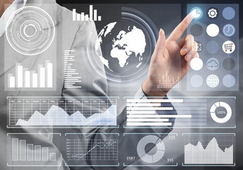 Hand of businesswoman pressing with finger icon on media screen