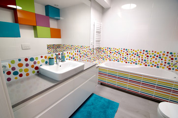 Interior of modern colourful bathroom