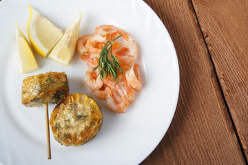 Mediterranean dish of shrimps with corn cobs. Dish of fresh, ecological clean products