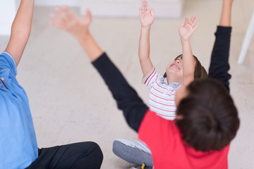 young boys having fun on the floor