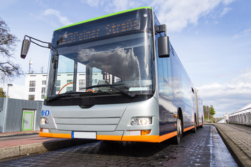 Fototapeta na wymiar german bus stands on a street