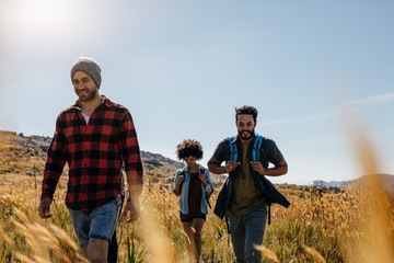 Three young friends on a country walk