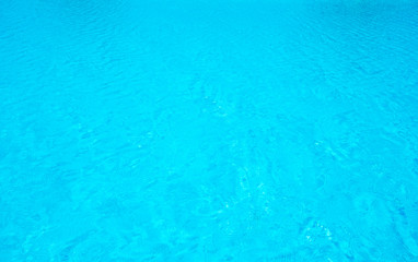 Blue sea surface with waves