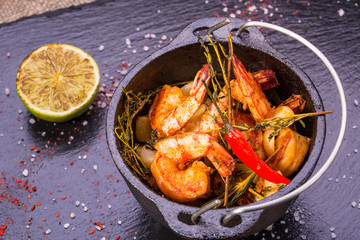 The fried shrimps with garlic and rosemary, the Spanish smoked paprika and a thyme
