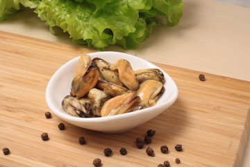 Mussels in oil on a plate