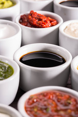 Pomegranate sauce with ketchup and ajika, a tomato, garlic, paprika and spices