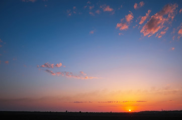 Fototapeta premium Fiery orange sunset sky. Beautiful colorful background.