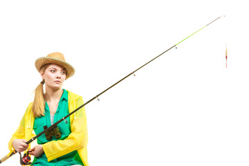 Woman with fishing rod , spinning equipment