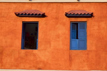 blue windows orange wall