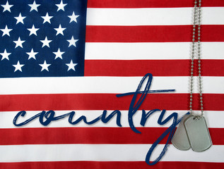 Obraz premium word country and military dog tags on American flag background