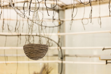 Wicker baskets hanging under ceiling