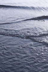 Small wave breaking on beach