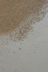 Water on pebble beach