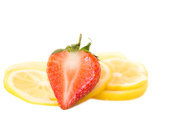 Colorful organic strawberry and lemon cuts slice isolated