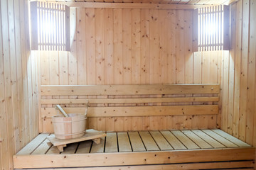 Obraz na płótnie Canvas Finnish wooden modern sauna interior