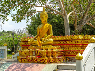 several statues of Buddha posture