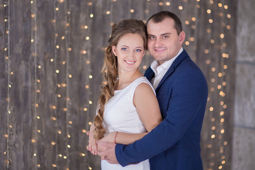 Couple celebrating new year's eve with champagne