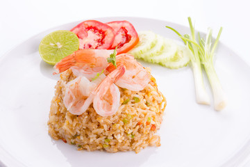 Thai fried rice with prawns in a white plate.