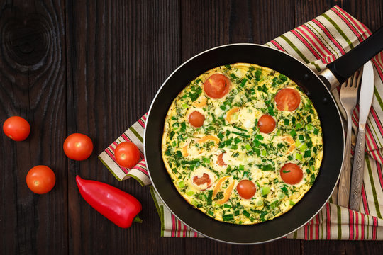 Omelette with tomatoes and pepper. Top view