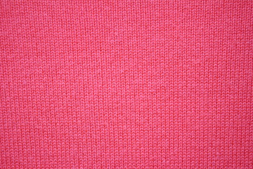 текстура однотонной  вязаной ткани , красного цвета    