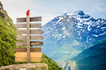 Wooden sign in norwegian mountains.