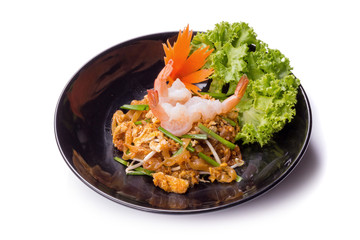 Fried noodle Thai style with prawns Stir fry noodles with shrimp in Pad Thai Thai noodle style Traditional food.