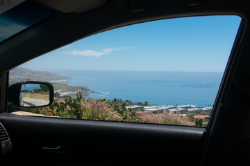 Naklejka premium ocean view from car window