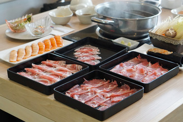 Shabu Shabu or Sukiyaki is a Japanese style and Korean style - Raw pork sliced for hot pot, Selective focus.