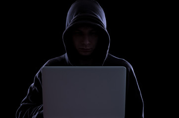Anonymous hacker in the dark