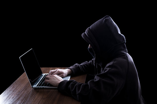 Anonymous hacker in the dark