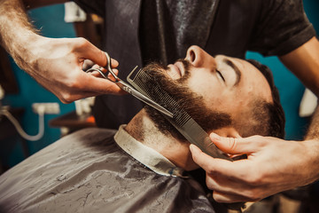 Barber's beard cuts a hipster
