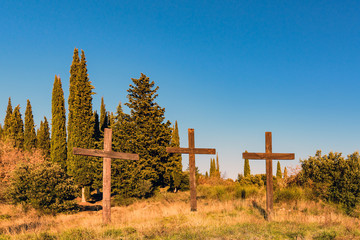 Wooden crusts in unspoilt nature to symbolize Christian religion