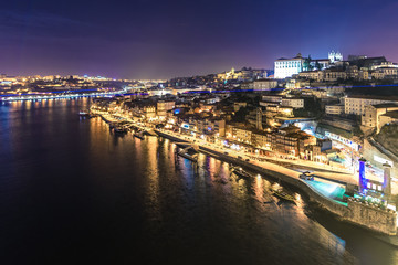 Fototapeta na wymiar Night view on the riverside of Porto city, Portugal
