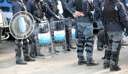 police with shields and riot gear during the event in the city